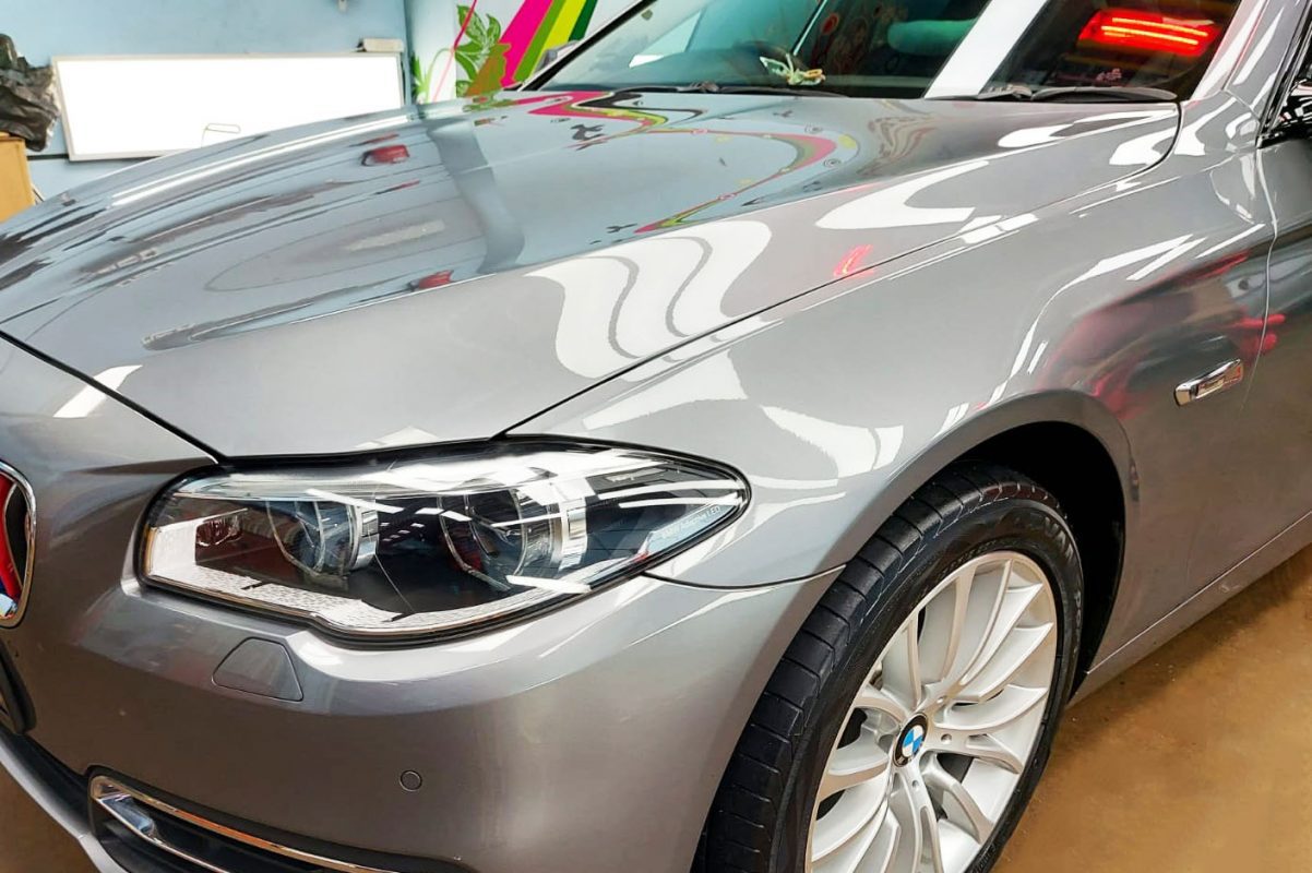 BMW 528i from a side angle after the ceramic coating.