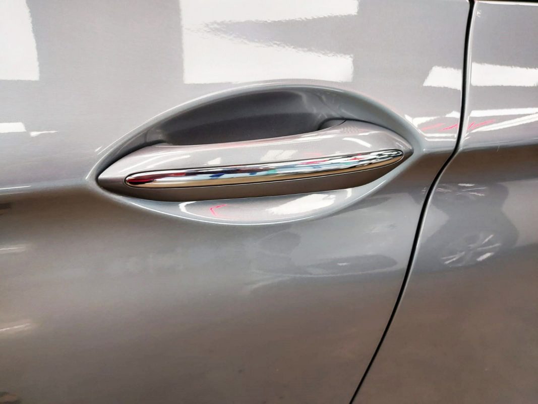 Front three-quarter view of the BMW 528i after coating.