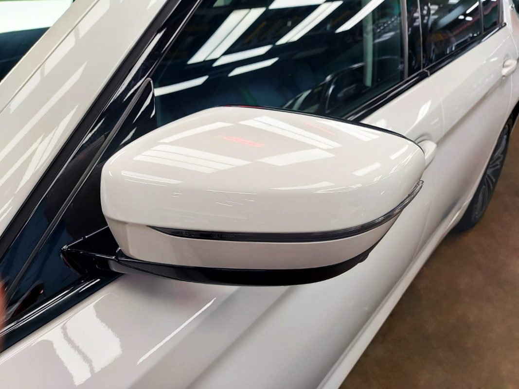 Side panel of the BMW 530e with the ceramic finish locked in.