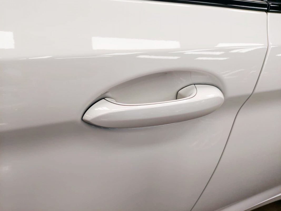 Front three-quarter view of the BMW 530e after coating.