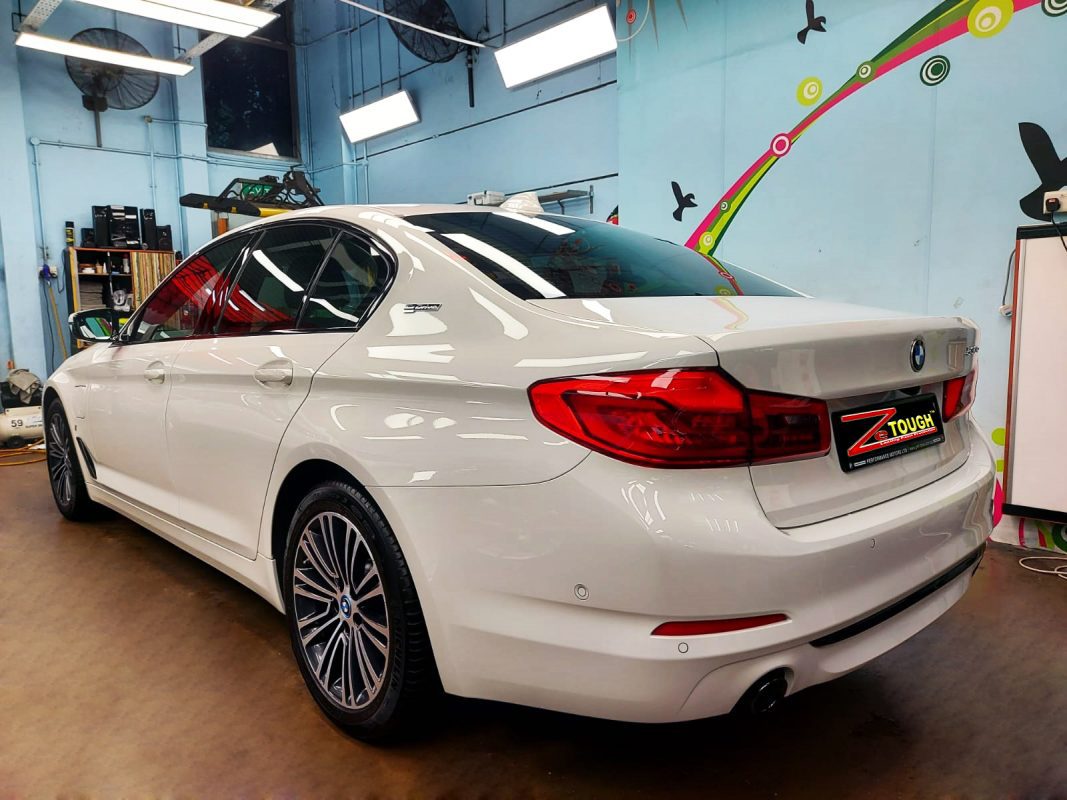 Rear quarter of the BMW 530e, glossy and protected.