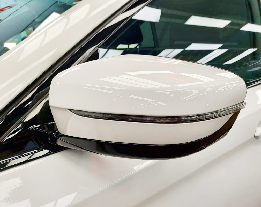 Side panel of the BMW 530i with the titanium finish locked in.