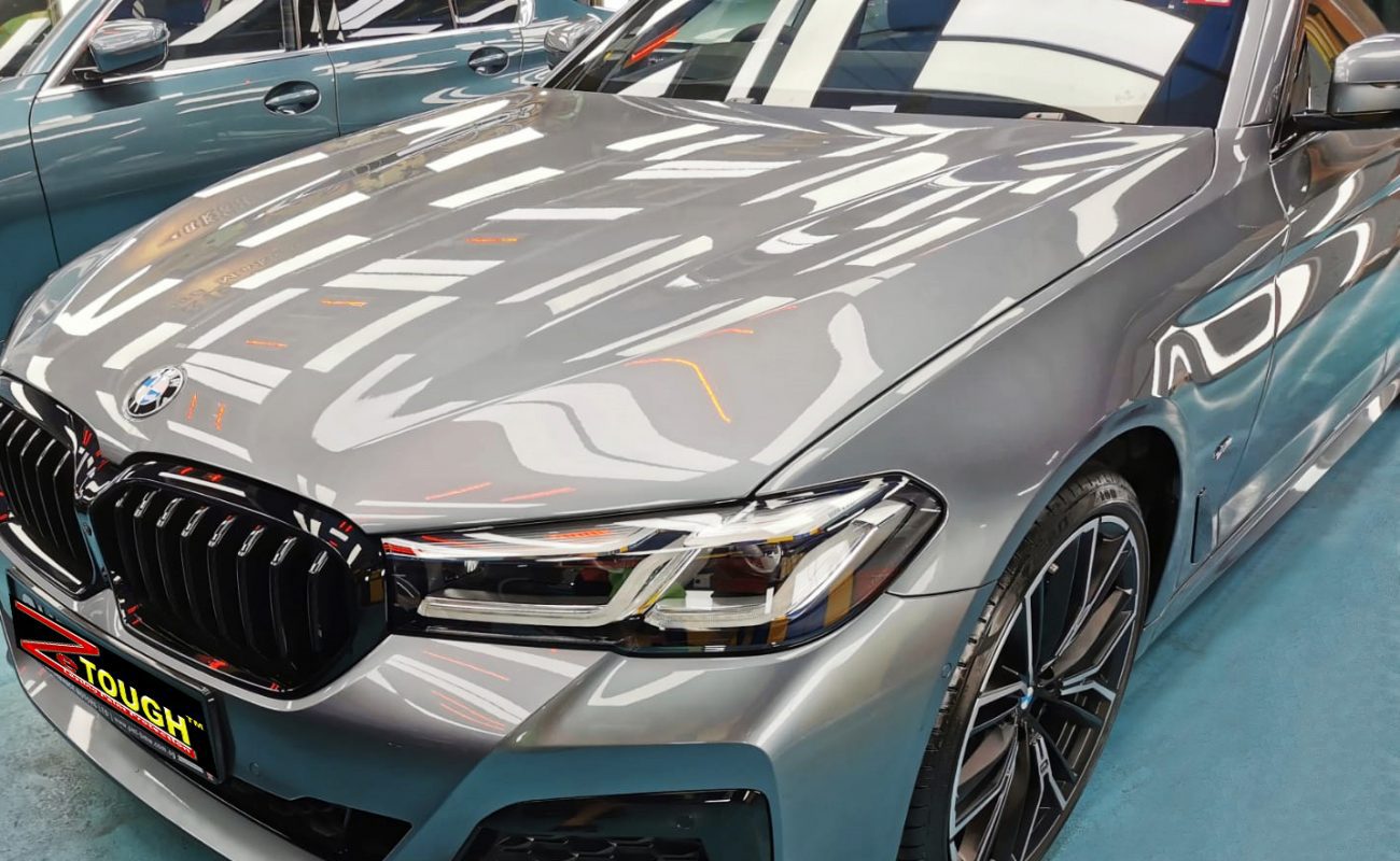 The BMW 530i from a side angle after the ceramic coating.
