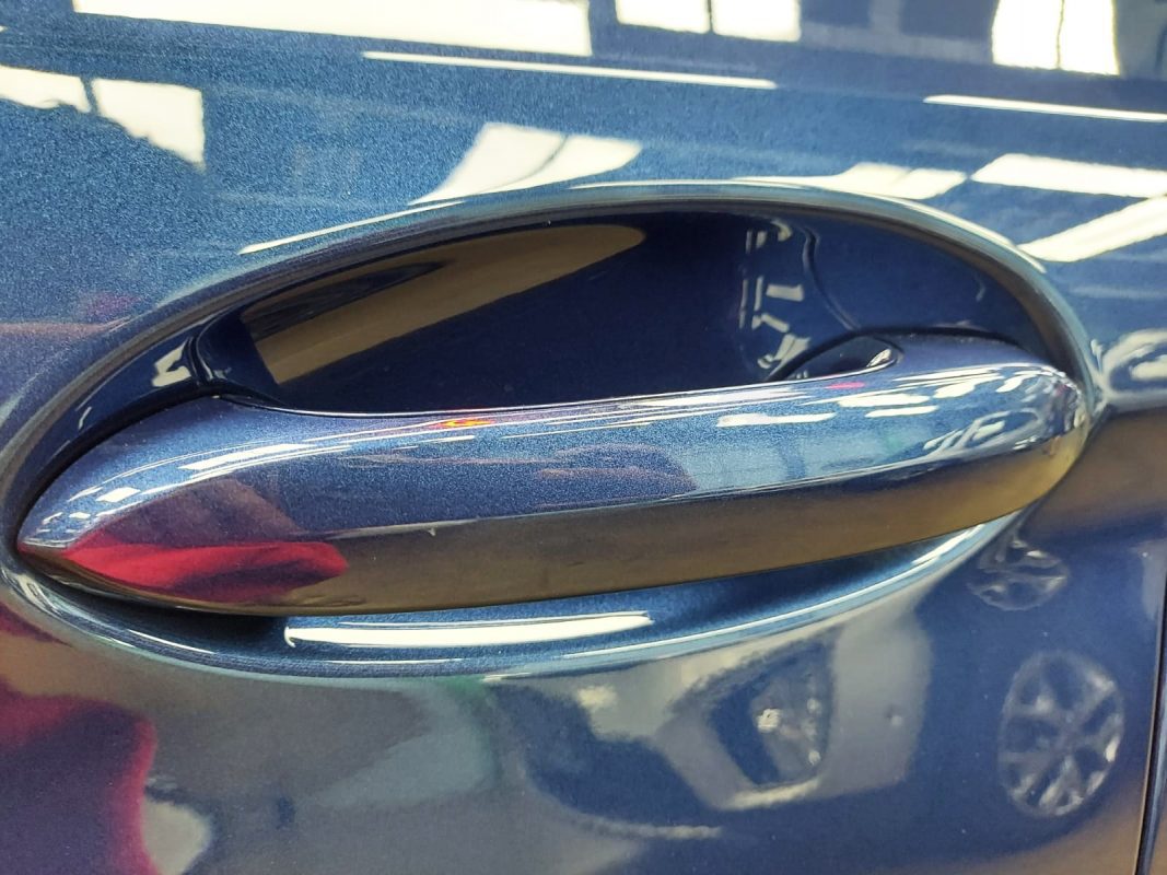 Front three-quarter view of the BMW 530i after coating.