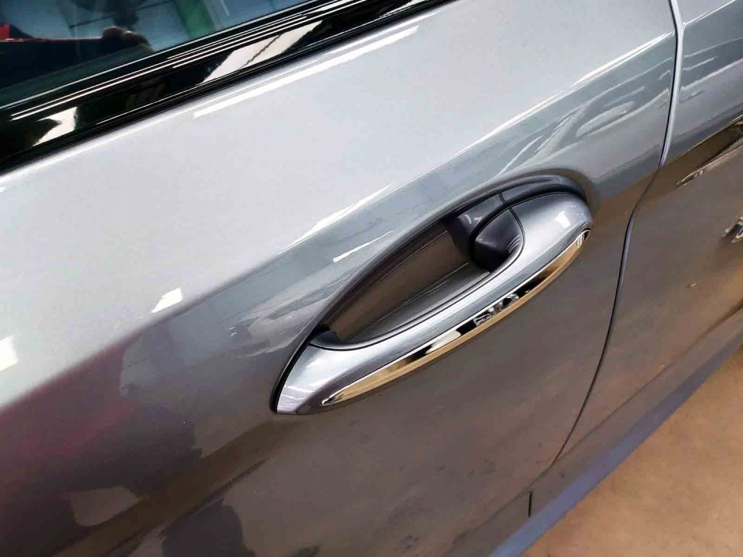 Front three-quarter view of the BMW 540i after coating.