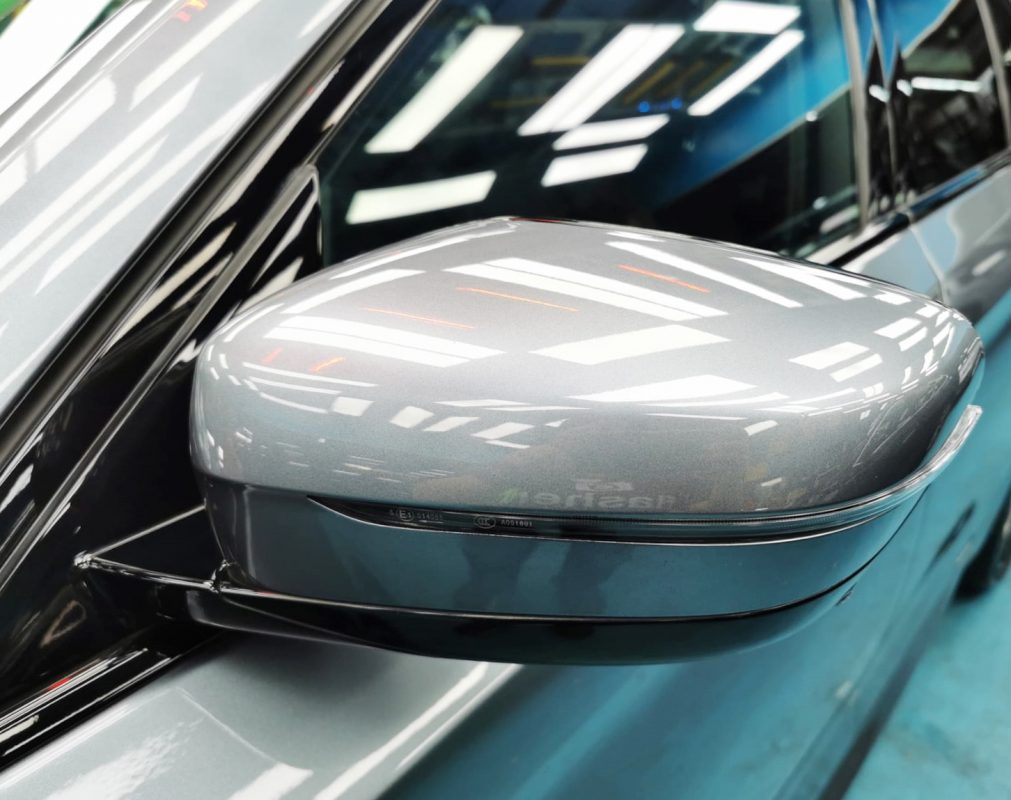 Side panel of the BMW 540i with the titanium finish locked in.