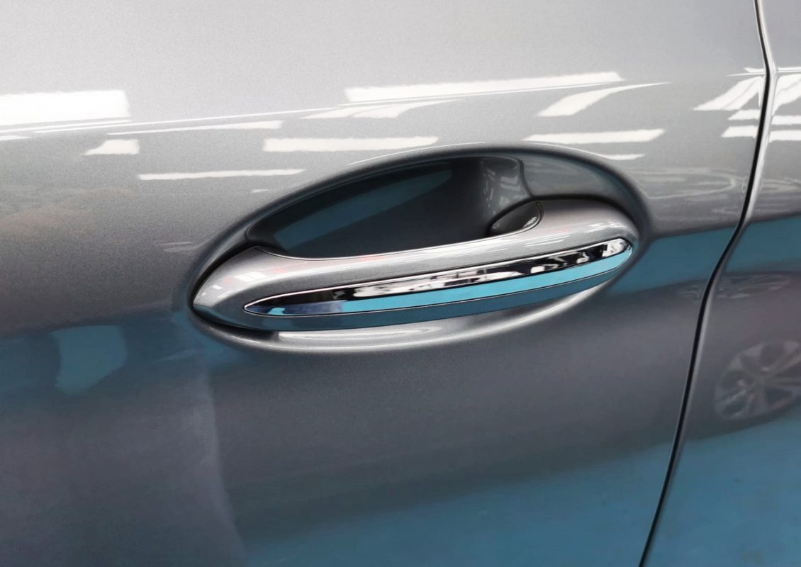 Front three-quarter view of the BMW 540i after coating.