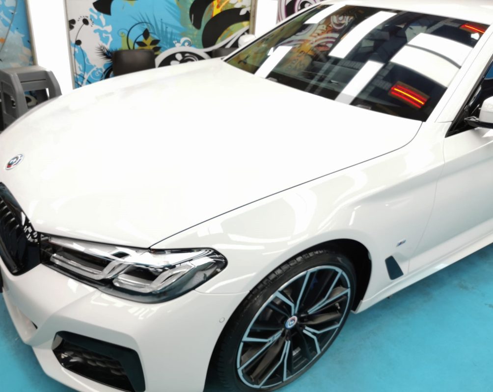 The BMW 5 Series from a side angle after the titanium coating.
