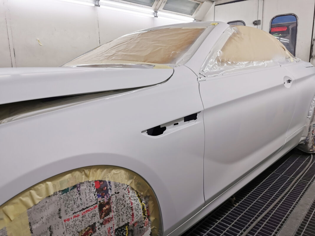 Masking applied to the BMW 6 Series ahead of the spray booth.