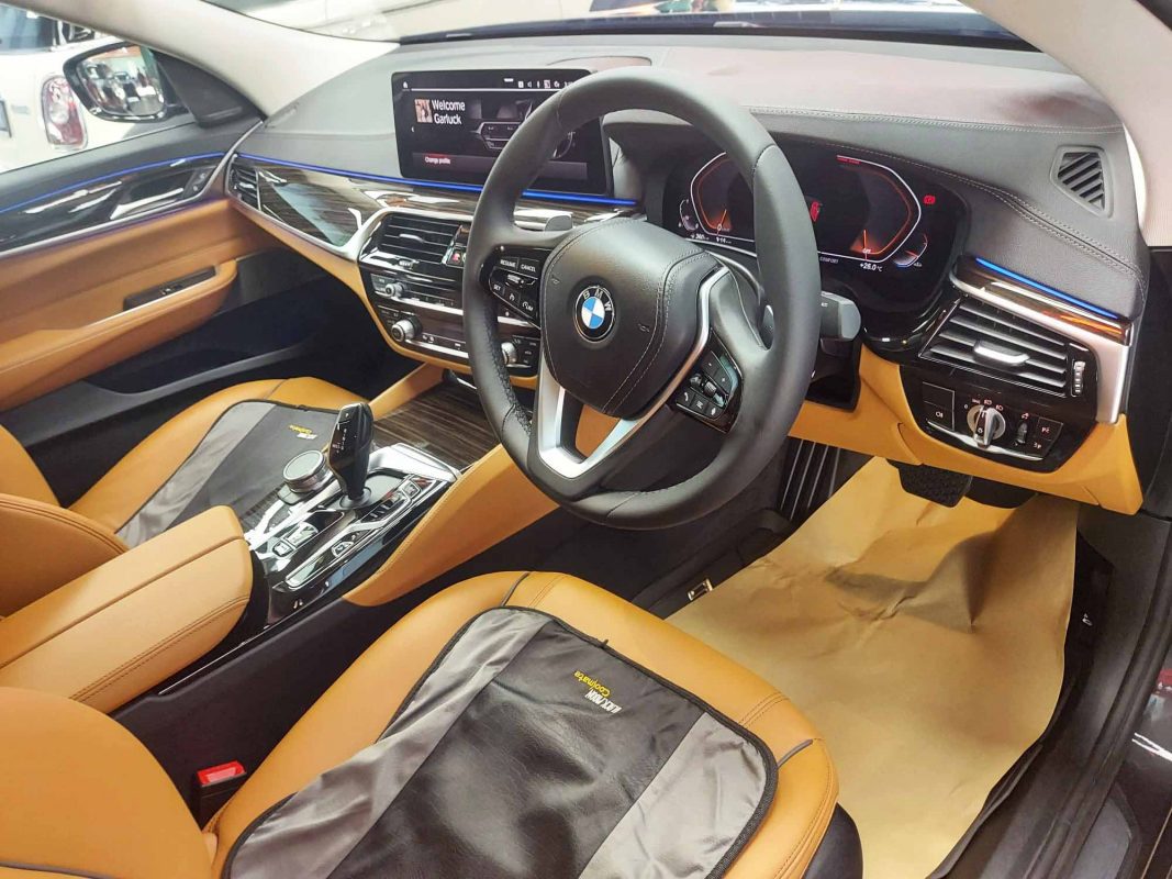 The BMW 6 Series parked in the workshop, freshly coated.