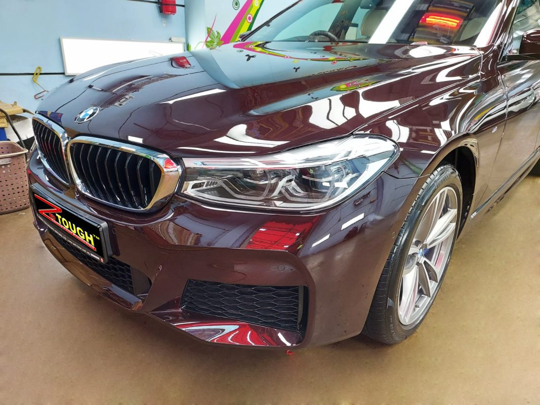 The BMW 630i GT from a side angle after the ceramic coating.