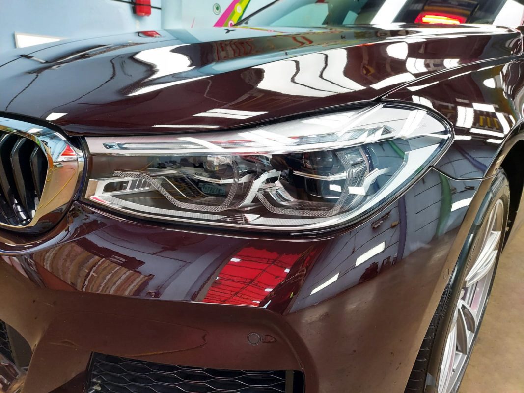 The 630i GT's coated paintwork showing clean reflections.