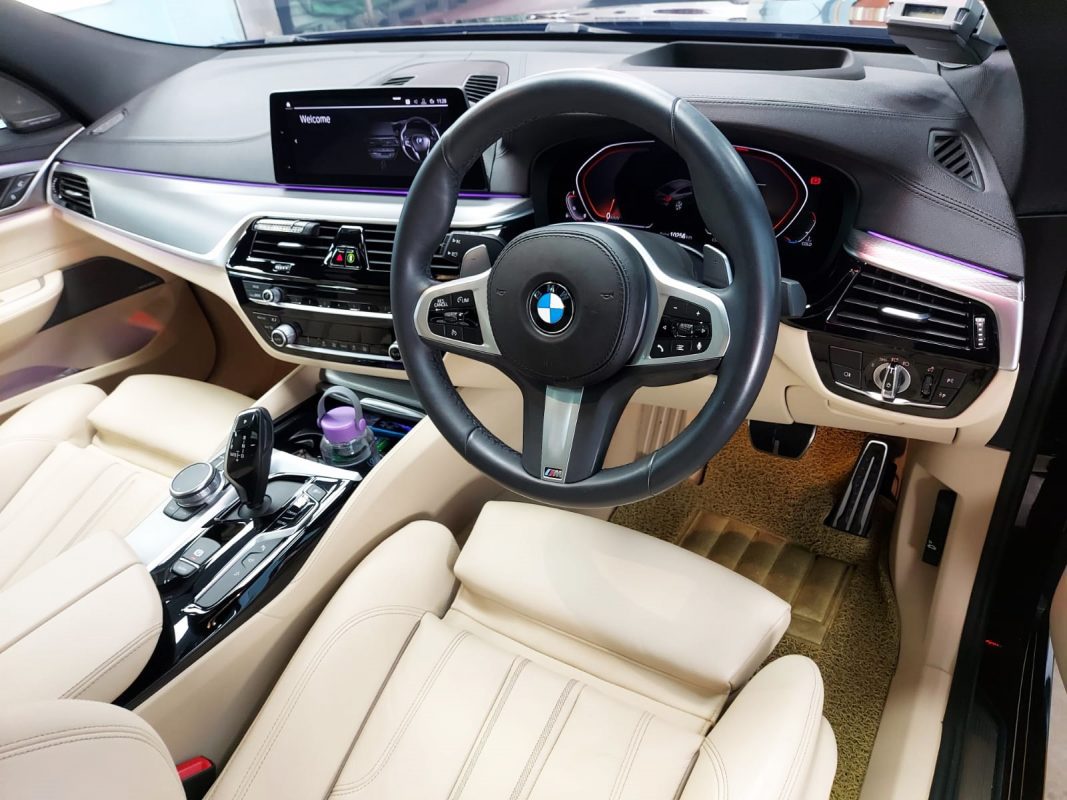 The BMW 630i GT parked in the workshop, freshly coated.