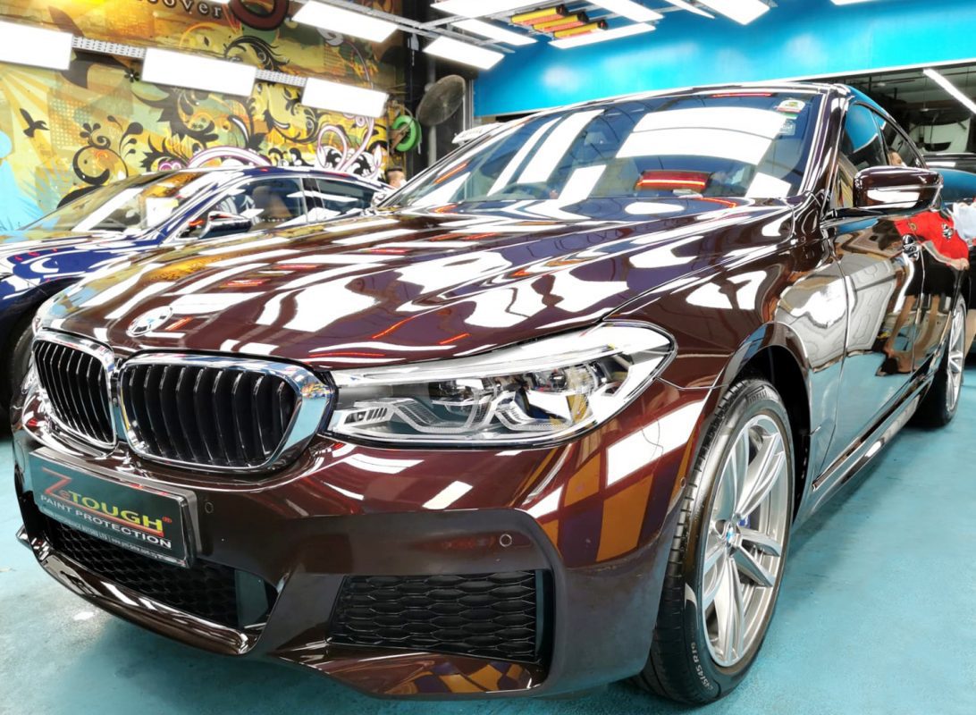 The 630i's coated paintwork showing clean reflections.