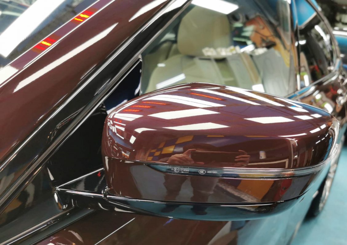 Rear quarter of the BMW 630i, glossy and protected.
