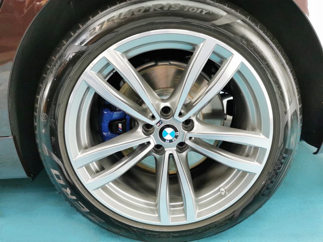 The BMW 630i's coated bodywork holding a deep gloss.