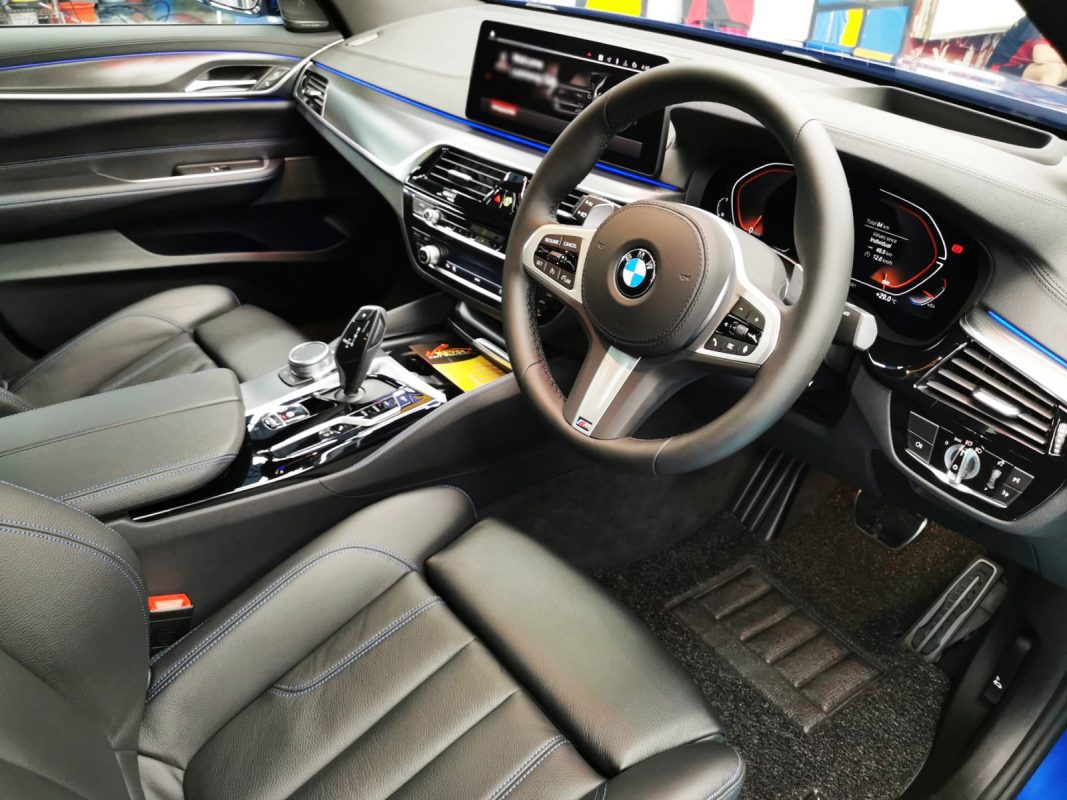 The BMW 630i parked in the workshop, freshly coated.