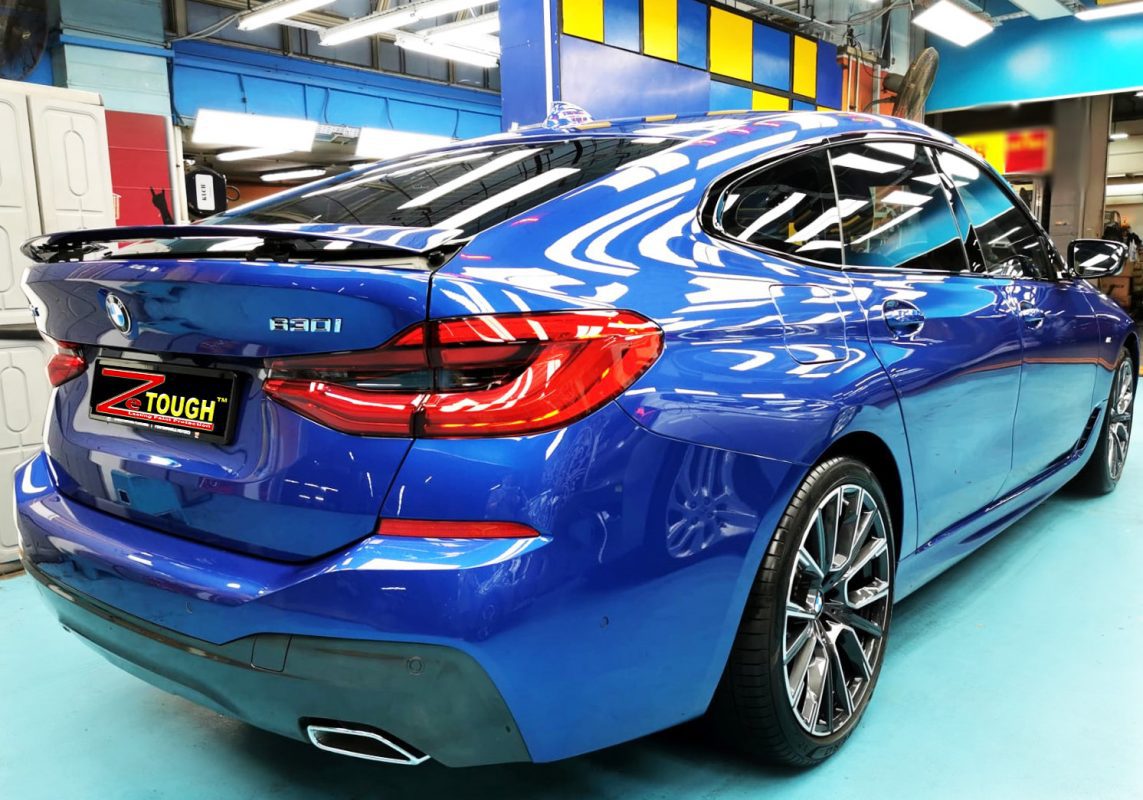 Rear quarter of the BMW 630i, glossy and protected.