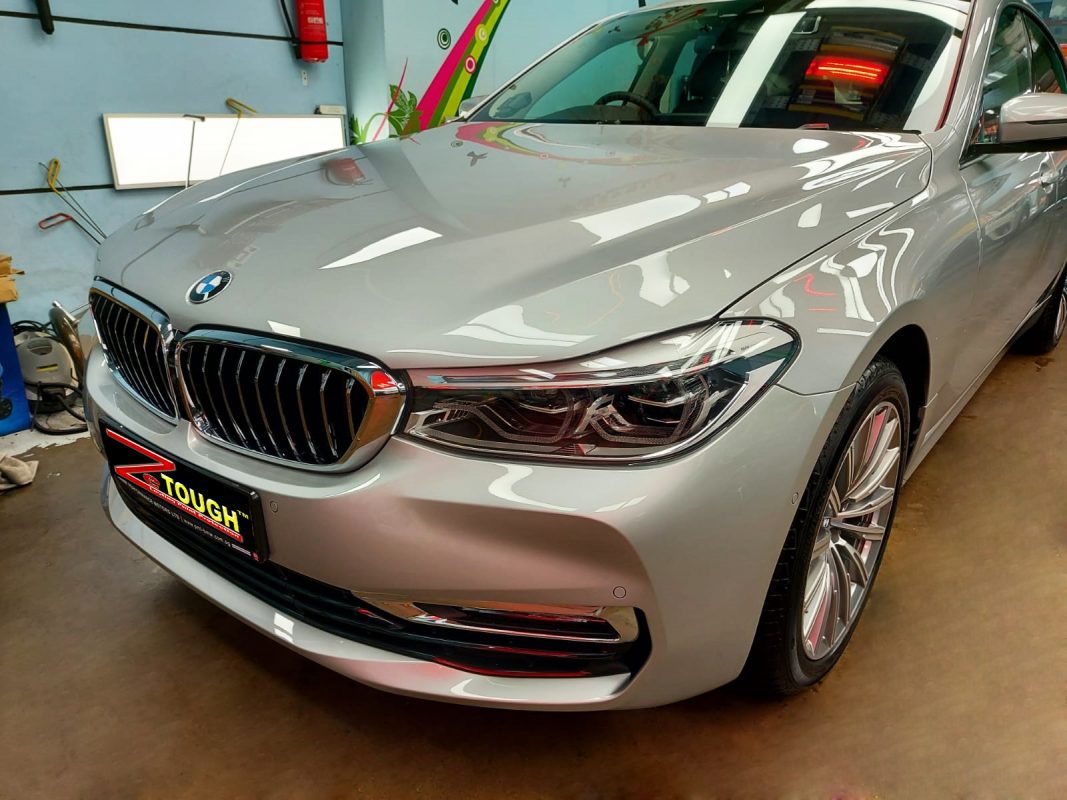 The BMW 630i GT from a side angle after the ceramic coating.