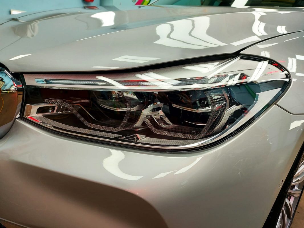The 630i GT's coated paintwork showing clean reflections.