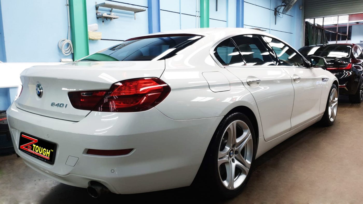 Rear quarter of the BMW 640i, glossy and protected.