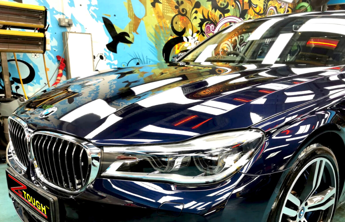 The BMW 7 Series from a side angle after the ceramic coating.