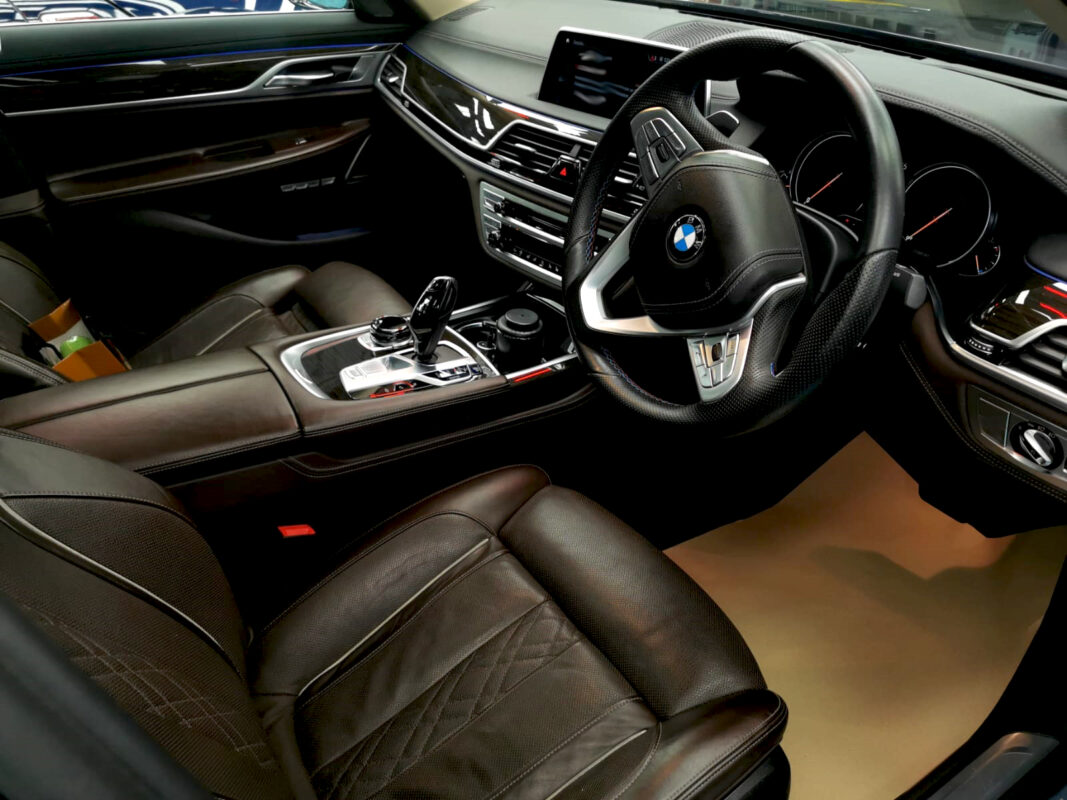 The BMW 7 Series parked in the workshop, freshly coated.