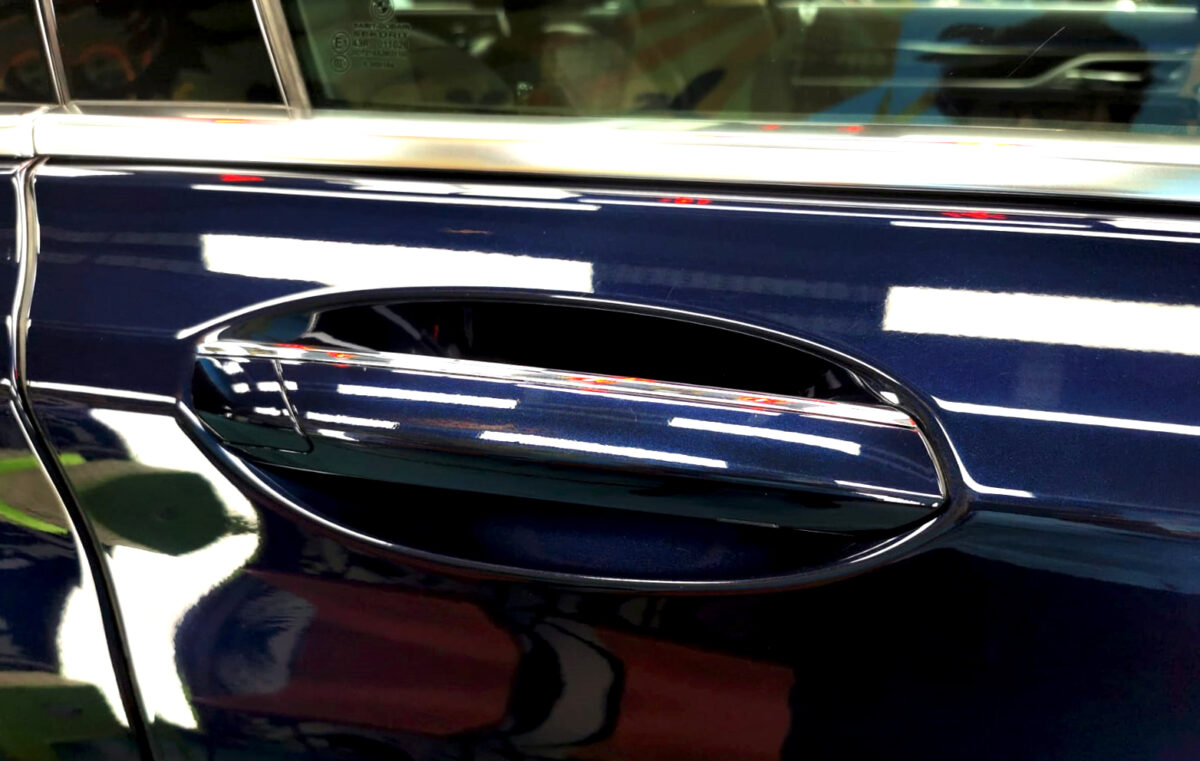 Front three-quarter view of the BMW 7 Series after coating.
