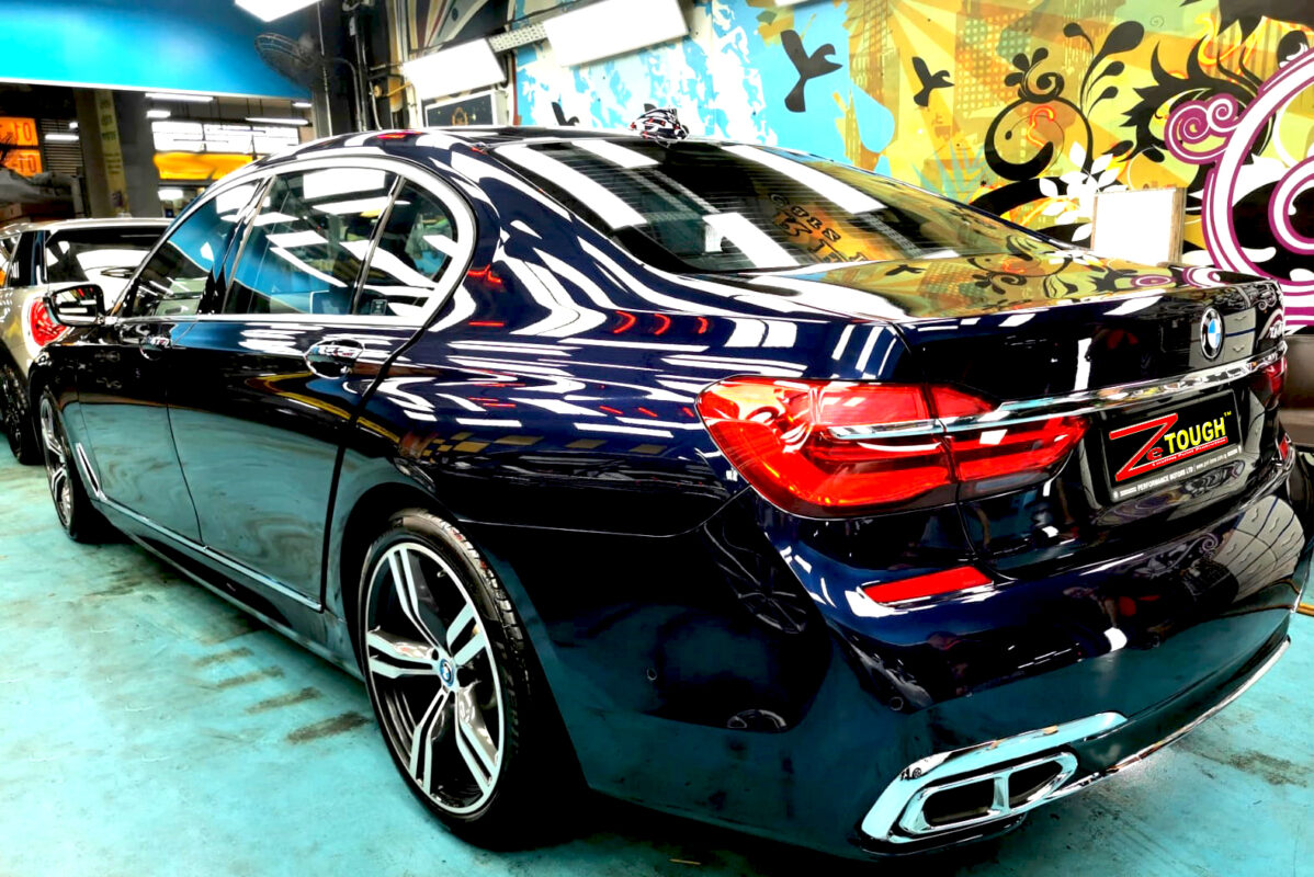 Rear quarter of the BMW 7 Series, glossy and protected.