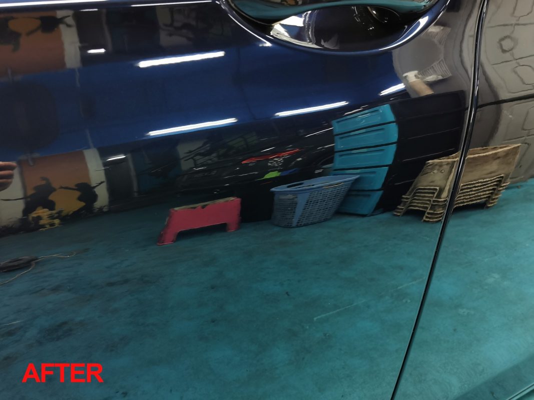 Glossy body panels on the resprayed 7 Series.