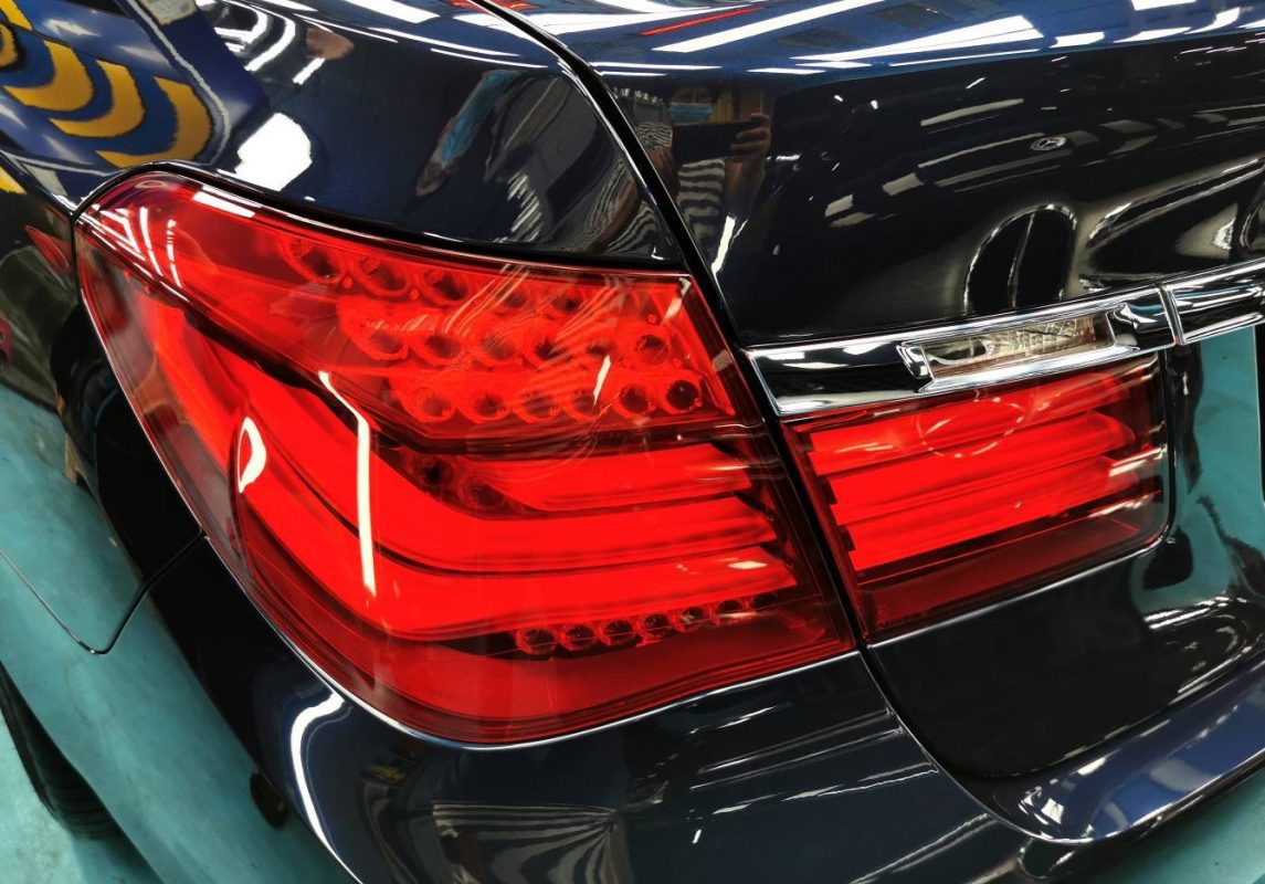 Close-up of the bodywork holding deep reflections.