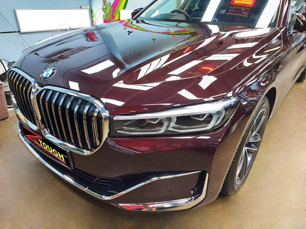 The BMW 730i from a side angle after the titanium coating.