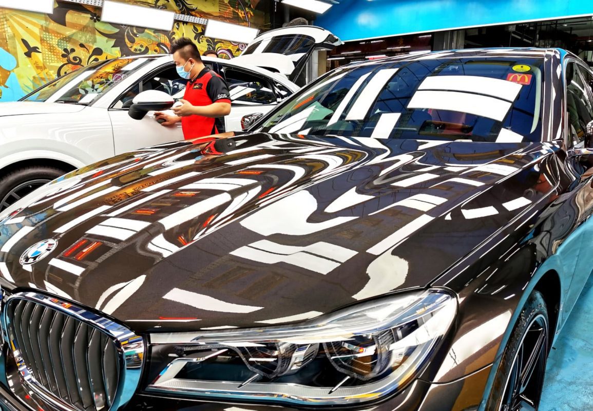 The BMW 730Li from a side angle after the ceramic coating.