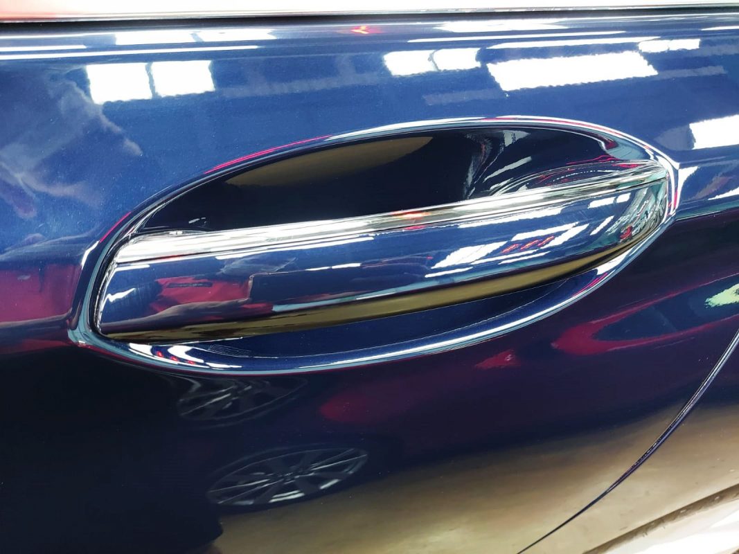 Front three-quarter view of the BMW 740Li after coating.