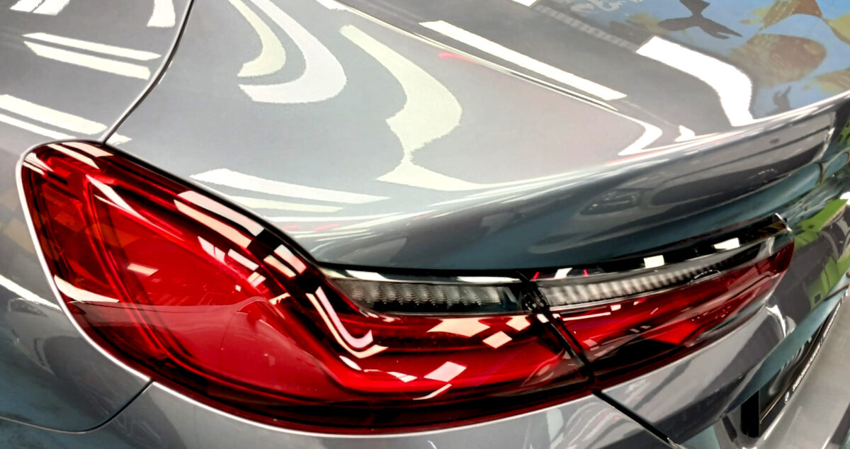 Rear quarter of the BMW 8 Series, glossy and protected.
