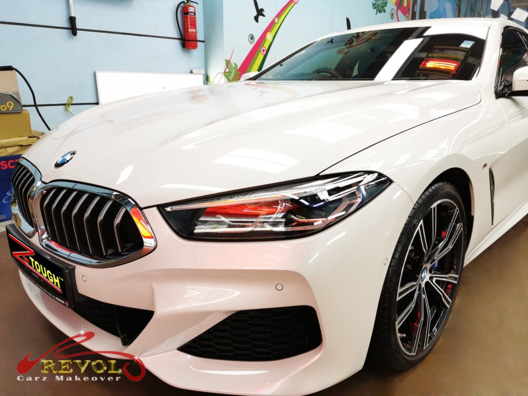 BMW 840i Gran Coupe from a side angle after the titanium coating.