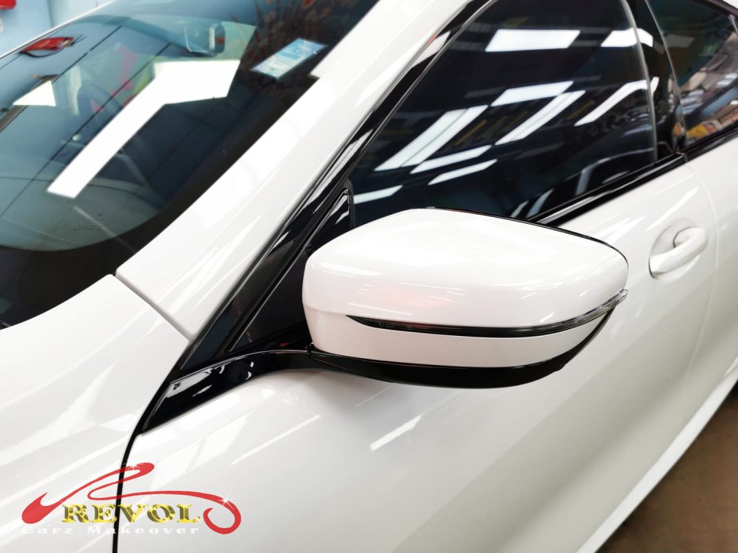 Side panel of the BMW 840i Gran Coupe with the titanium finish locked in.