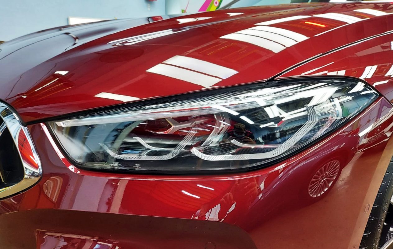 The 840i's coated paintwork holding clean reflections.