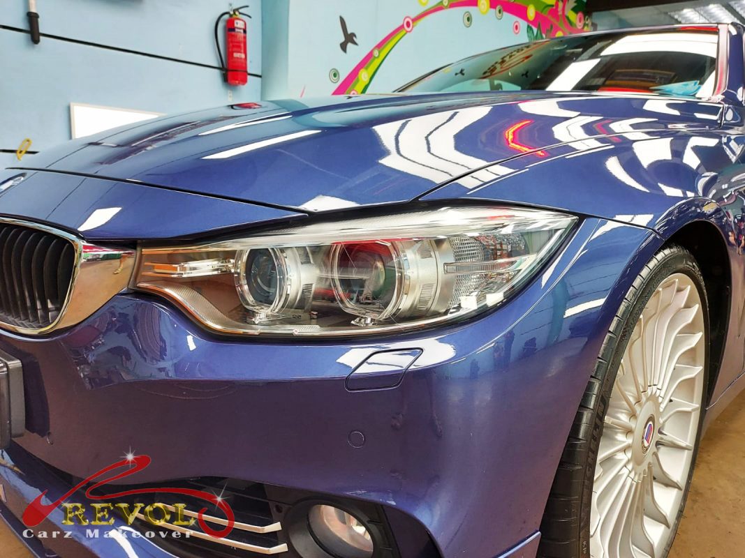 The Alpina B4's coated paintwork showing clean reflections.