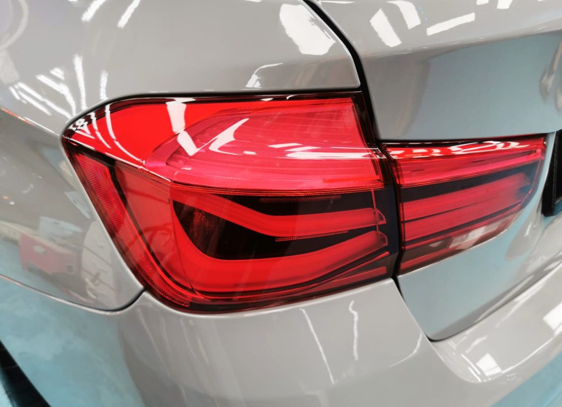 Front grille and headlight area, sharp and clean.