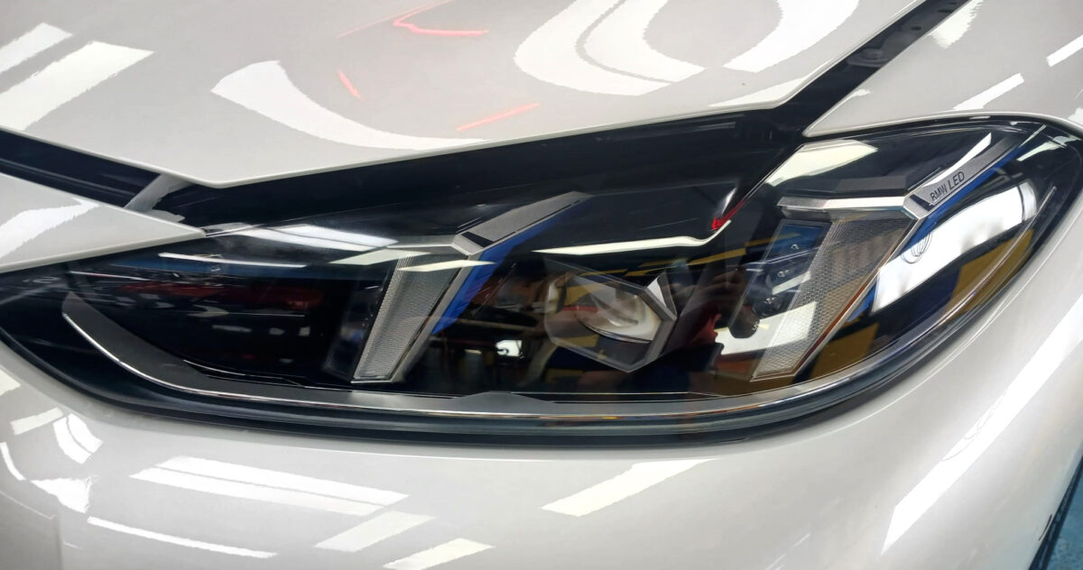 The i4's coated paintwork showing clean reflections.