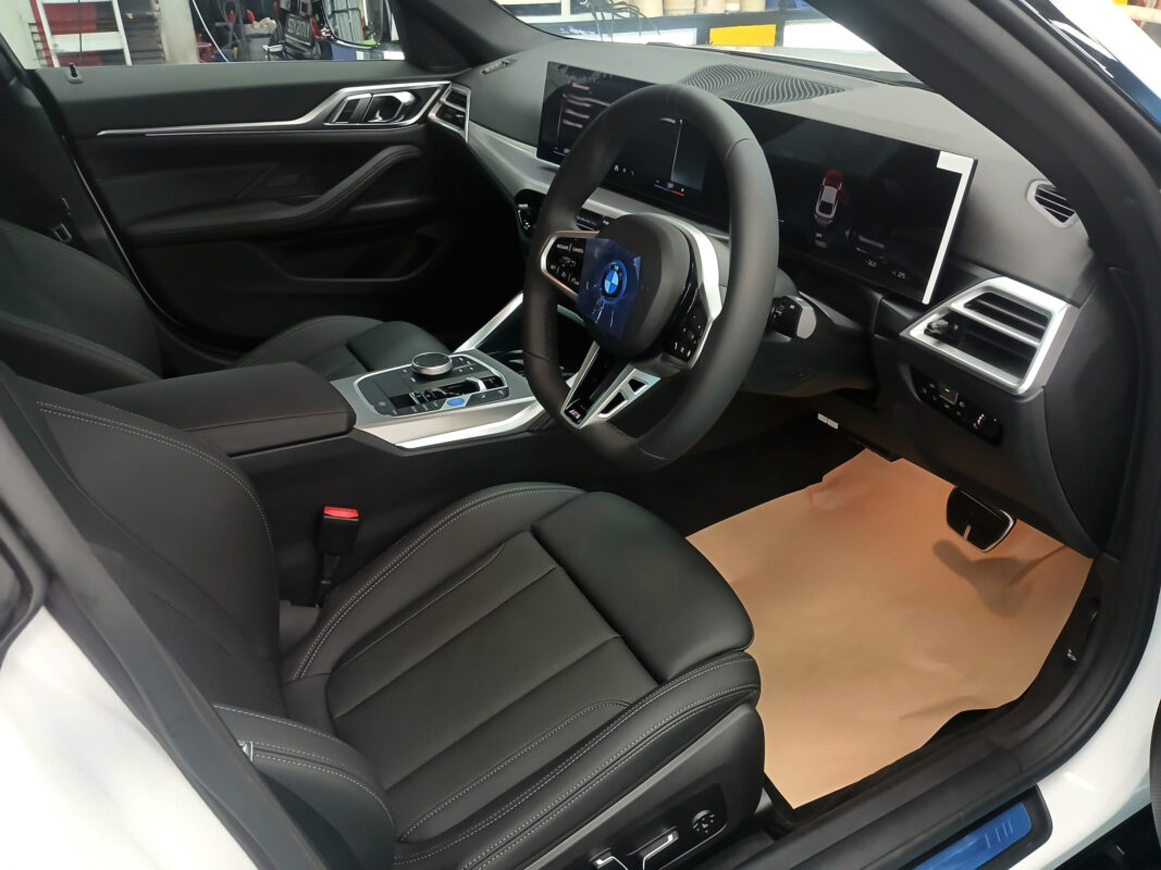 Front three-quarter view of the BMW i4 after coating.