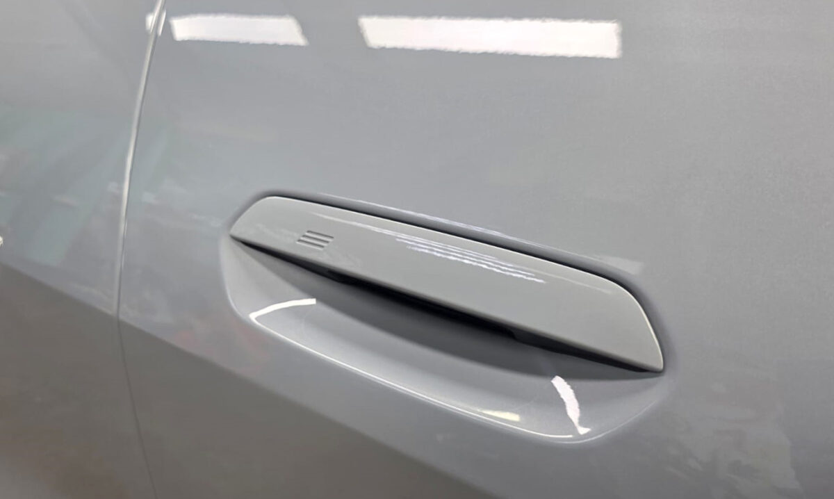 The coated paintwork of the BMW i4, clean and sharp.