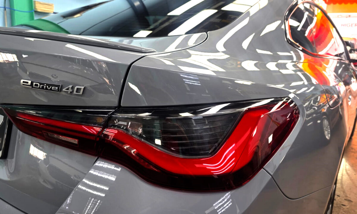 The finished BMW i4, glossy and protected.