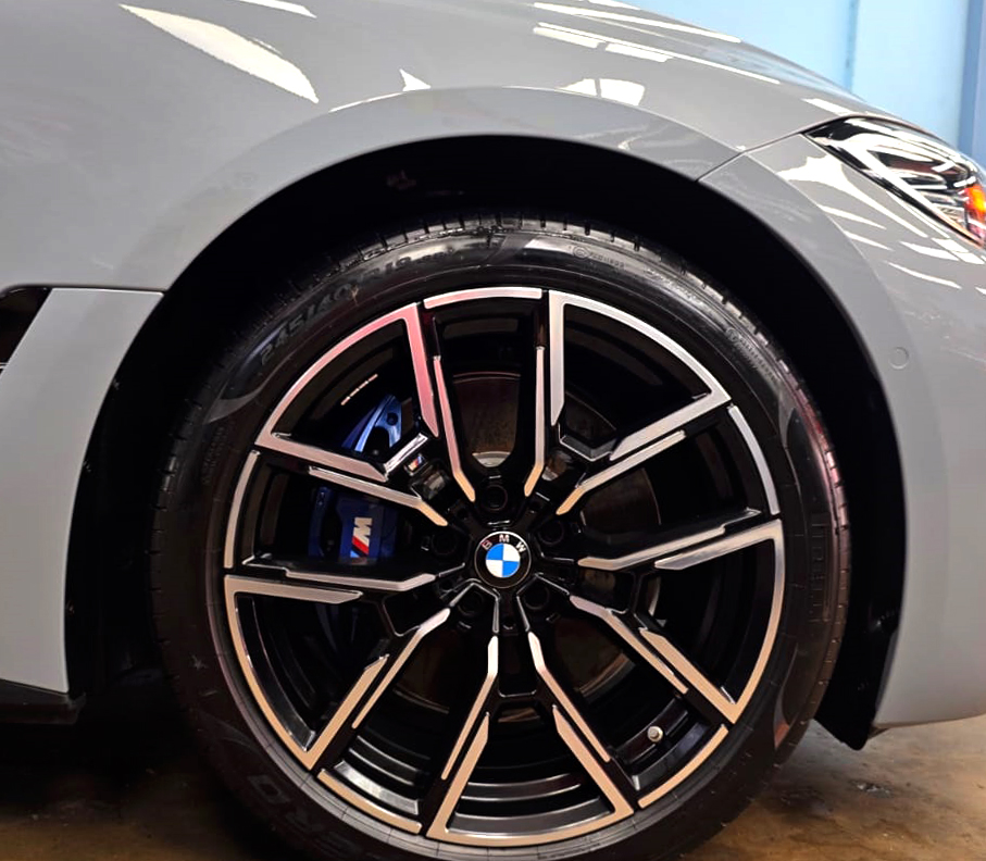 The BMW i4 with its fresh, coated finish.