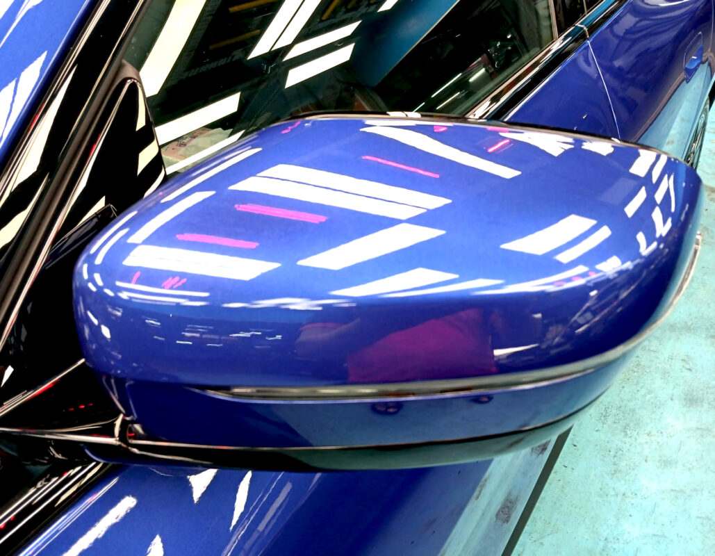 Side panel of the BMW i4 with the titanium finish locked in.