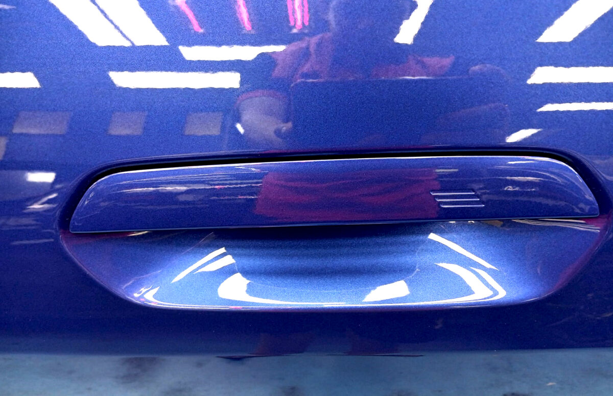Front three-quarter view of the BMW i4 after coating.