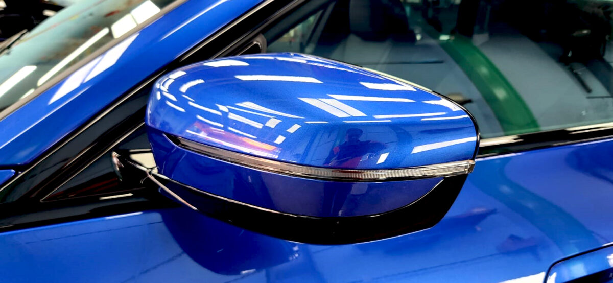 Side panel of the BMW i4 with the ceramic finish locked in.