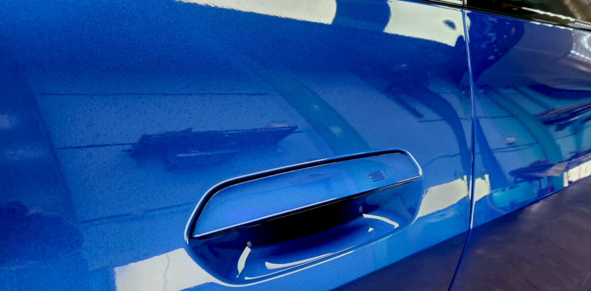 Front three-quarter view of the BMW i4 after coating.