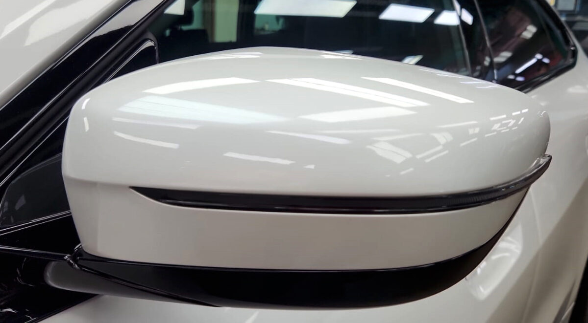 Side panel of the BMW i4 with the titanium finish locked in.
